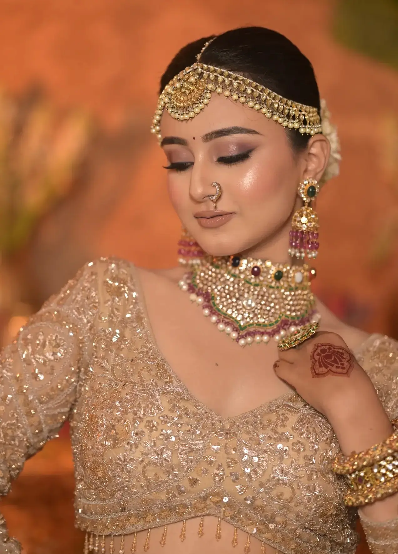 Kaya Planet bride wearing a luminous traditional bridal look